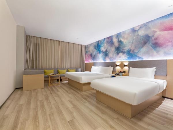 星程西安钟楼回民街酒店 : photo 4 de la chambre family room (interior window)