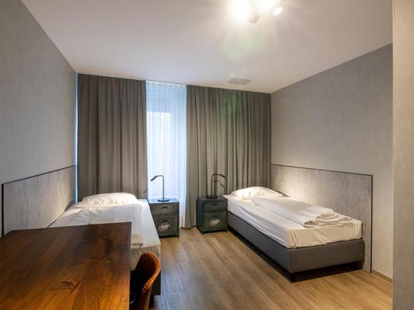 mk monteurzimmer stuttgart : photo 2 de la chambre chambre lits jumeaux