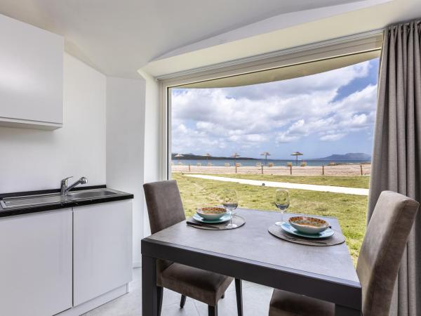 Baia del Sole Resort : photo 4 de la chambre appartement - vue sur mer