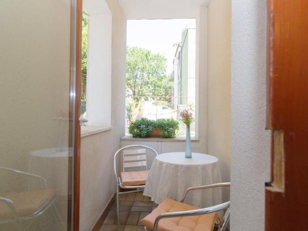 Bed & Breakfast PALMA : photo 10 de la chambre chambre triple avec balcon