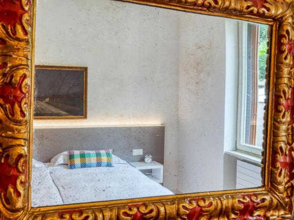 Villa by @ Home Hotel Locarno : photo 6 de la chambre appartement familial deluxe