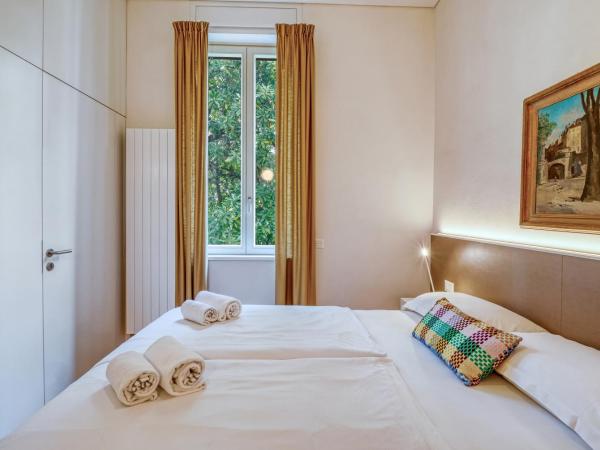 Villa by @ Home Hotel Locarno : photo 8 de la chambre chambre supérieure lit queen-size