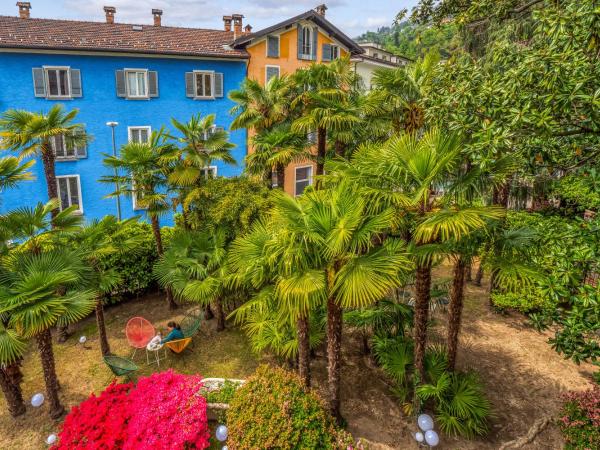 Villa by @ Home Hotel Locarno : photo 10 de la chambre suite de luxe avec balcon