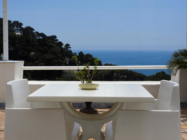 Villa Calypso : photo 10 de la chambre suite junior lit king-size avec terrasse