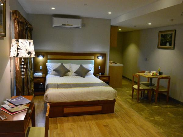 Melrose Apartments : photo 3 de la chambre grand studio