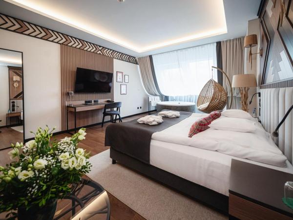 Rysy Boutique Hotel : photo 5 de la chambre executive apartment with jacuzzi and mountain view