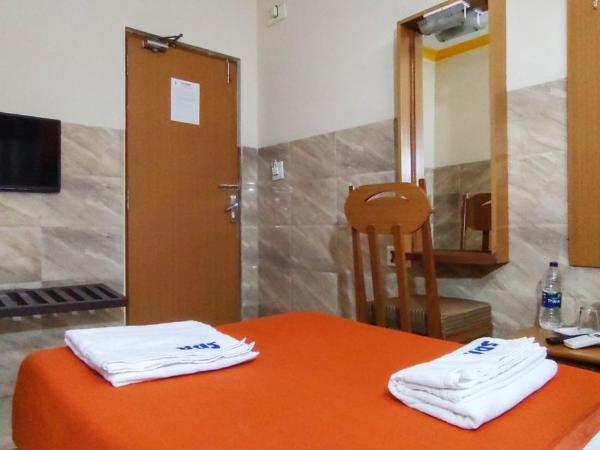 Sarovara Deluxe Rooms : photo 3 de la chambre chambre simple deluxe