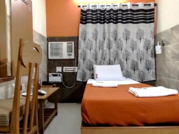 Sarovara Deluxe Rooms : photo 4 de la chambre chambre simple deluxe