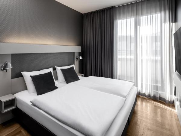 Hotel AMANO Rooms & Apartments : photo 1 de la chambre appartement l