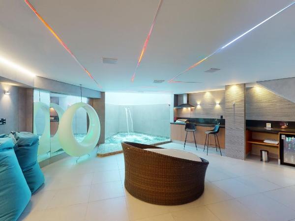 Motel DUBAI BH : photo 2 de la chambre suite avec piscine privée