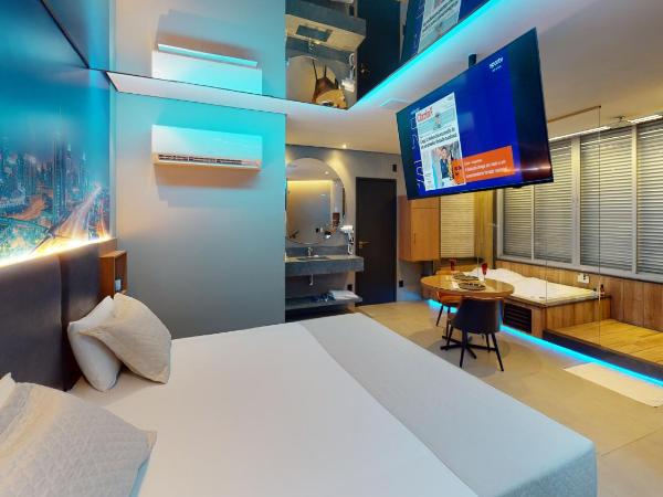 Motel DUBAI BH : photo 6 de la chambre suite avec piscine privée