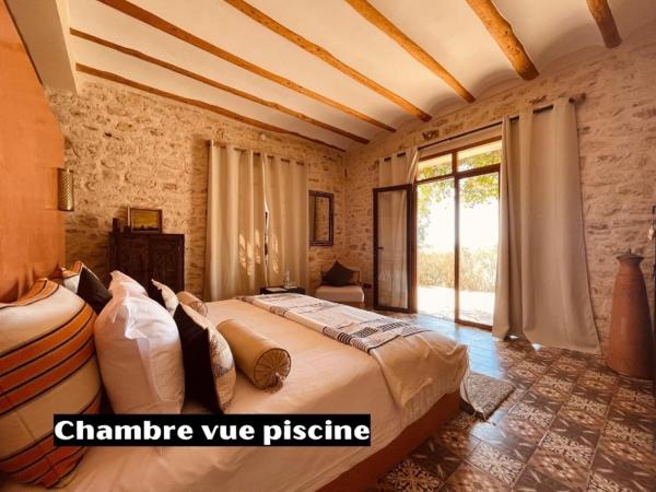 Villa des Hauts Mogador : photo 1 de la chambre chambre lit king-size - vue sur piscine 