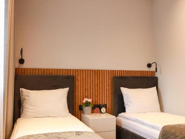 Apart-hotel Dream : photo 6 de la chambre chambre lits jumeaux avec salle de bains