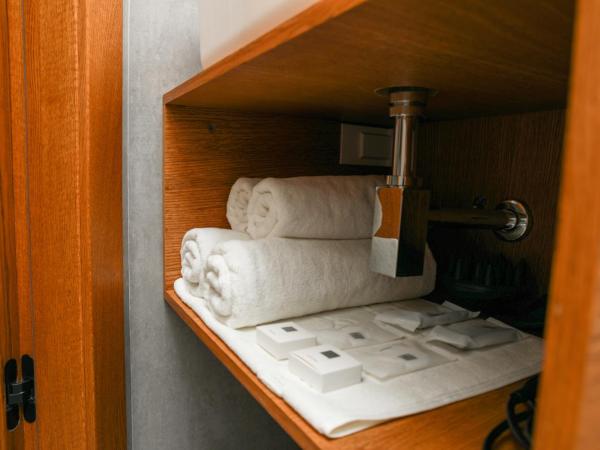 Apart-hotel Dream : photo 10 de la chambre chambre lits jumeaux avec salle de bains