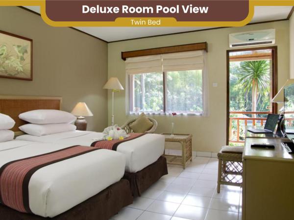 The Jayakarta Yogyakarta Hotel & Spa : photo 1 de la chambre chambre lits jumeaux - vue sur piscine