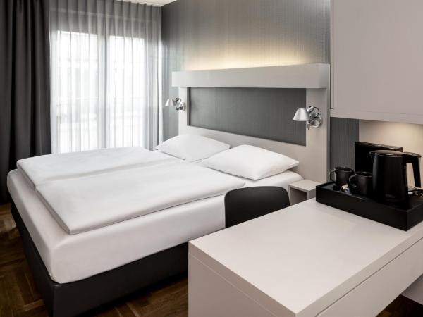 Hotel AMANO Rooms & Apartments : photo 1 de la chambre chambre double
