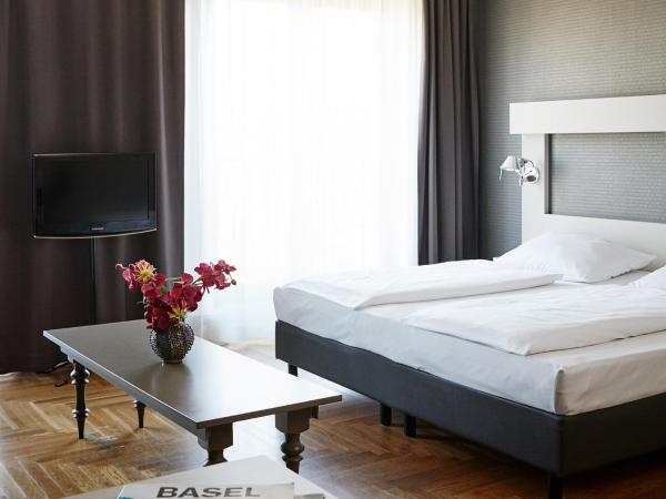Hotel AMANO Rooms & Apartments : photo 1 de la chambre appartement m