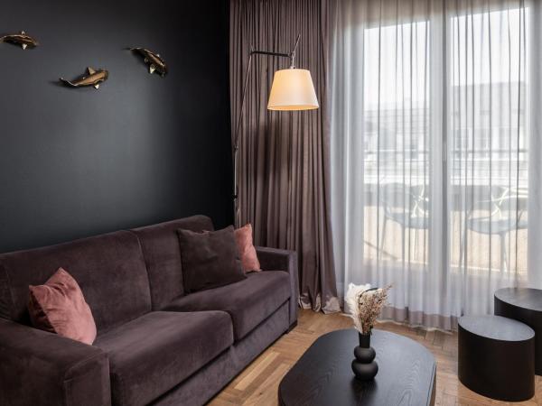 Hotel AMANO Rooms & Apartments : photo 3 de la chambre appartement l