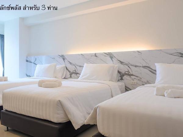 Donmueang Place Hotel - SHA Plus : photo 1 de la chambre chambre triple supérieure