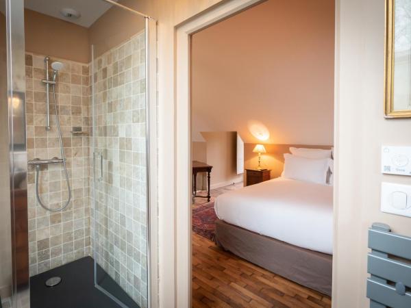 Domaine de Charnay - Résidence de charme : photo 8 de la chambre suite - vue sur jardin