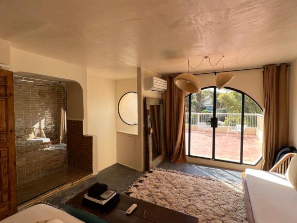 MORO Marrakech Boutique Hôtel : photo 10 de la chambre suite junior avec vue jardin sur le majorelle
