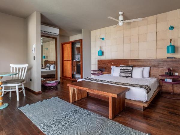 Mi Amor Boutique Hotel-Adults Only : photo 10 de la chambre hébergement avec bain à remous rafraîchissant – vue partielle sur mer