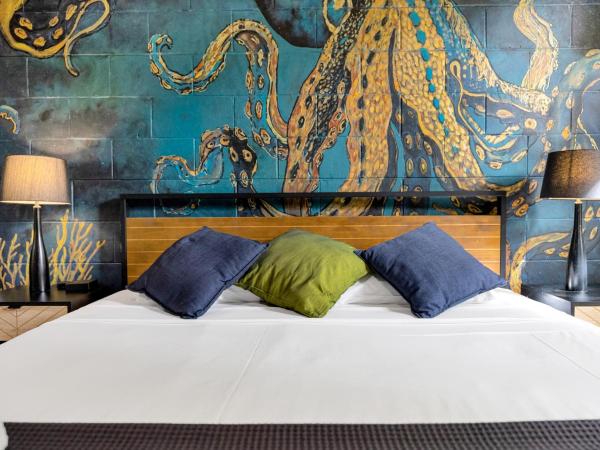 The Palms At Palm Cove : photo 6 de la chambre two-bedroom apartment with direct pool access