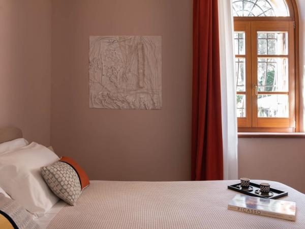 Sella&Mosca Casa Villamarina : photo 6 de la chambre chambre lit king-size supérieure