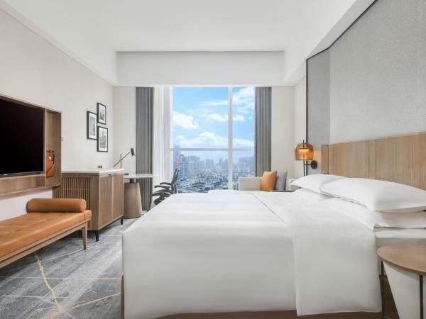 Sheraton Guangzhou Hotel : photo 1 de la chambre chambre lit king-size supérieure - vue sur ville