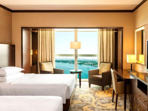 Sheraton Dubai Creek Hotel & Towers : photo 4 de la chambre chambre deluxe avec 2 lits jumeaux - vue sur rivière