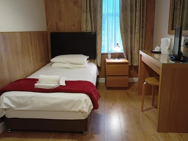 Westgate Hotel : photo 1 de la chambre chambre simple avec salle de bains commune