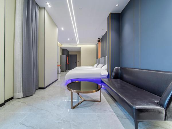 Fd Club Hotel - Qian Tan : photo 3 de la chambre chambre triple deluxe