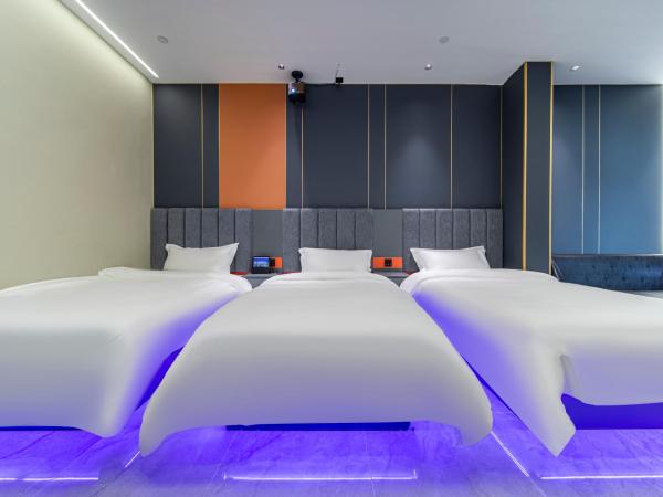 Fd Club Hotel - Qian Tan : photo 6 de la chambre chambre triple deluxe