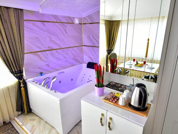 Loca Suit : photo 3 de la chambre suite avec baignoire spa
