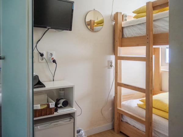 24 Guesthouse Dongdaemun Market : photo 6 de la chambre chambre lits jumeaux