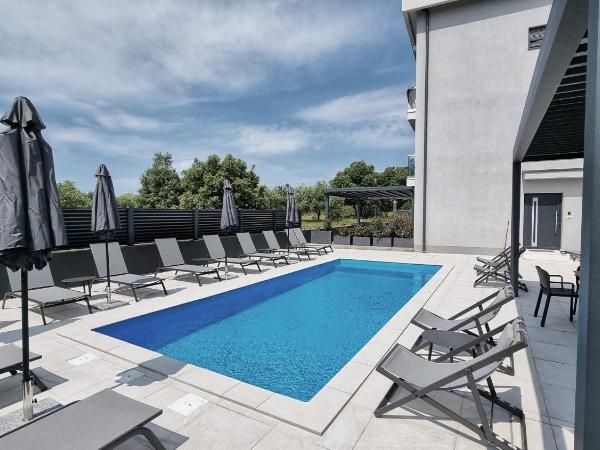 Luxury Residence Levante : photo 5 de la chambre chambre lit king-size deluxe