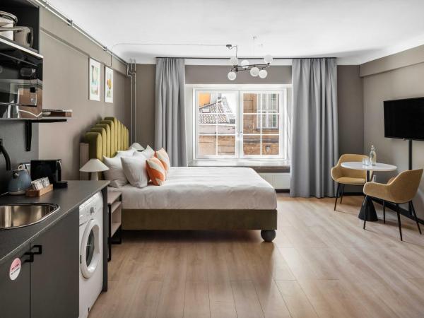 numa I Hallen Apartments : photo 1 de la chambre large studio with kitchenette