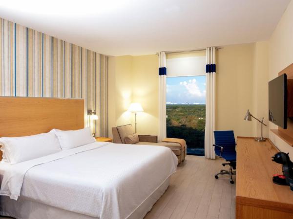 Four Points by Sheraton Cancun Centro : photo 1 de la chambre chambre lit king-size deluxe - vue sur ville