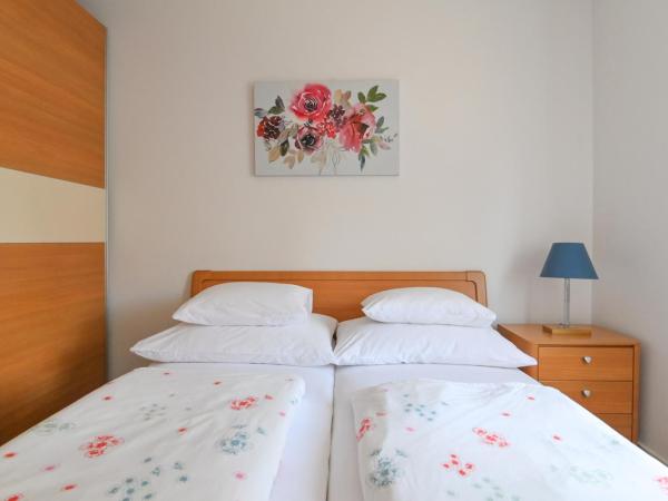 Apartments Basic : photo 10 de la chambre chambre lits jumeaux avec balcon