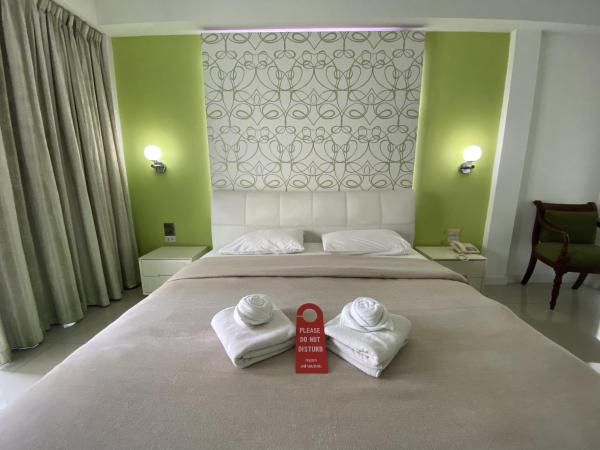Access Inn Pattaya : photo 6 de la chambre chambre lit king-size