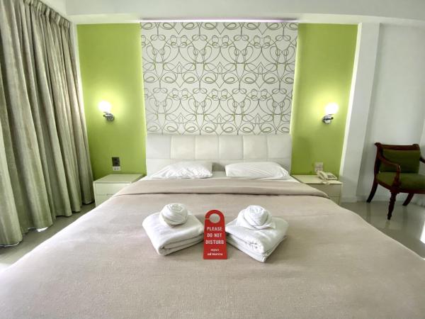 Access Inn Pattaya : photo 1 de la chambre chambre lit king-size