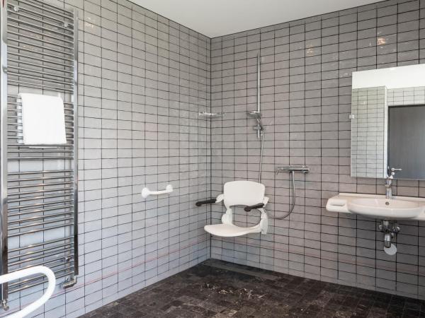 Apollo Hotel Amsterdam, a Tribute Portfolio Hotel : photo 6 de la chambre chambre lit king-size design 