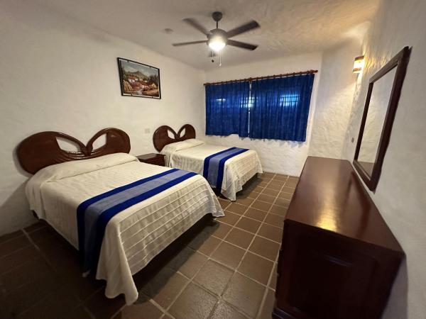 Hotel Quijote Inn : photo 3 de la chambre chambre double avec 2 lits doubles