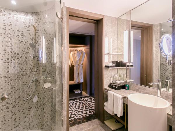 Centara Grand At CentralWorld : photo 3 de la chambre hébergement lit king-size de luxe - club 