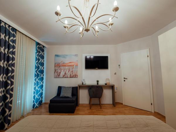 Guesthouse Villa Diana : photo 6 de la chambre chambre triple avec balcon