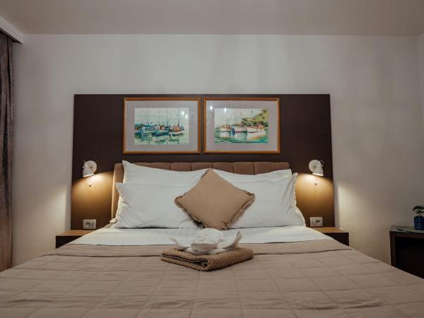 Guesthouse Villa Diana : photo 5 de la chambre chambre triple deluxe - vue sur mer