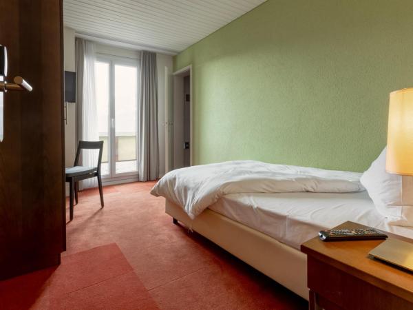 Pension Arosa - Self Check-In : photo 2 de la chambre chambre simple standard