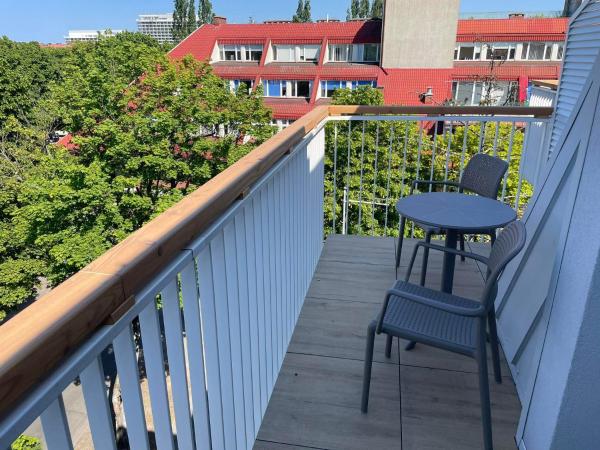 Promień Słońca : photo 1 de la chambre chambre triple avec balcon (2 adultes + 1 enfant) 