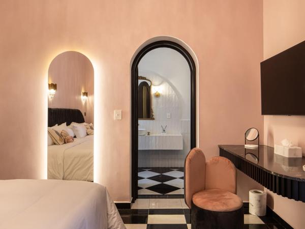 HOLT Hotel De Mi Independencia Double Queen Room : photo 5 de la chambre studio