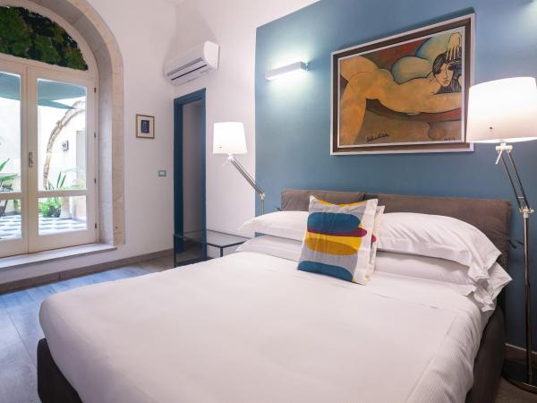 Palazzo Gilistro : photo 4 de la chambre suite deluxe avec baignoire spa